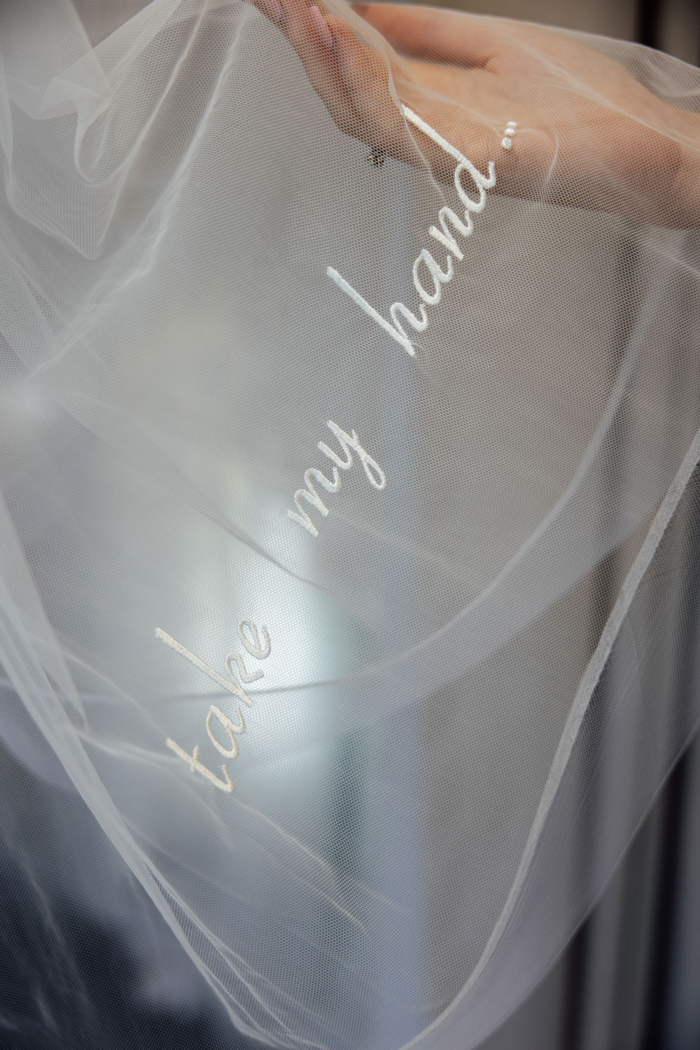 Embroidered lyric veil